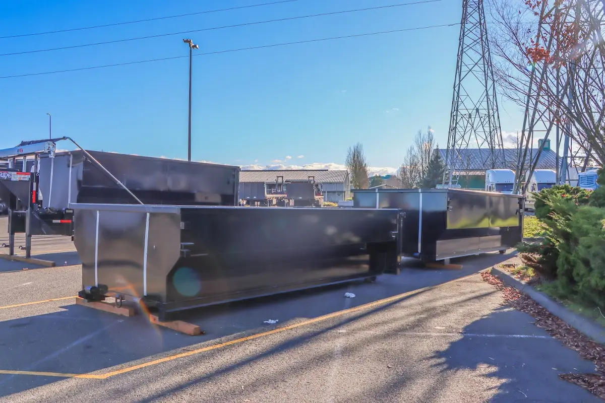 Roll-off dumpster ready for waste disposal at job site for 12 Yard Dumpster Rental in Fort Belvoir